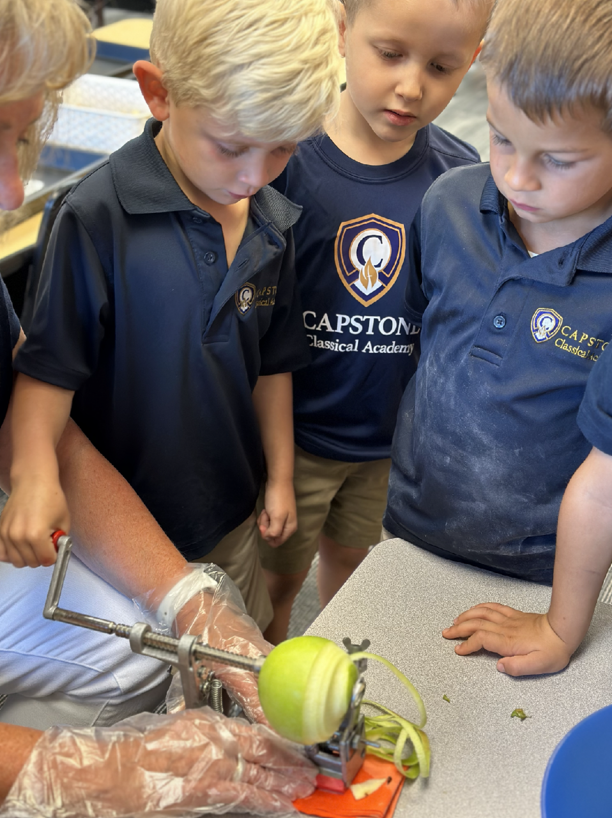 Boys with apple corer